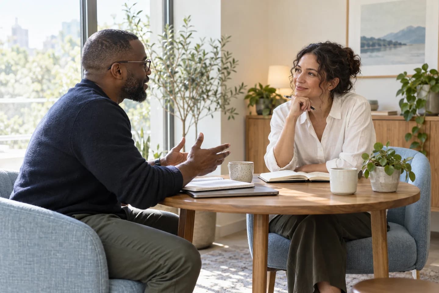 Professionals exchanging ideas in a mentoring session